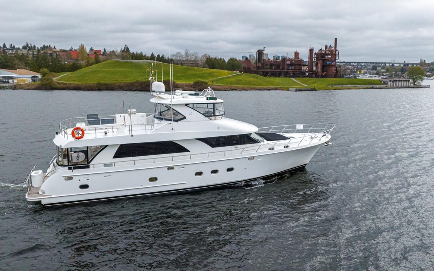 a white yacht on the water aboard COCONUT Yacht for Sale