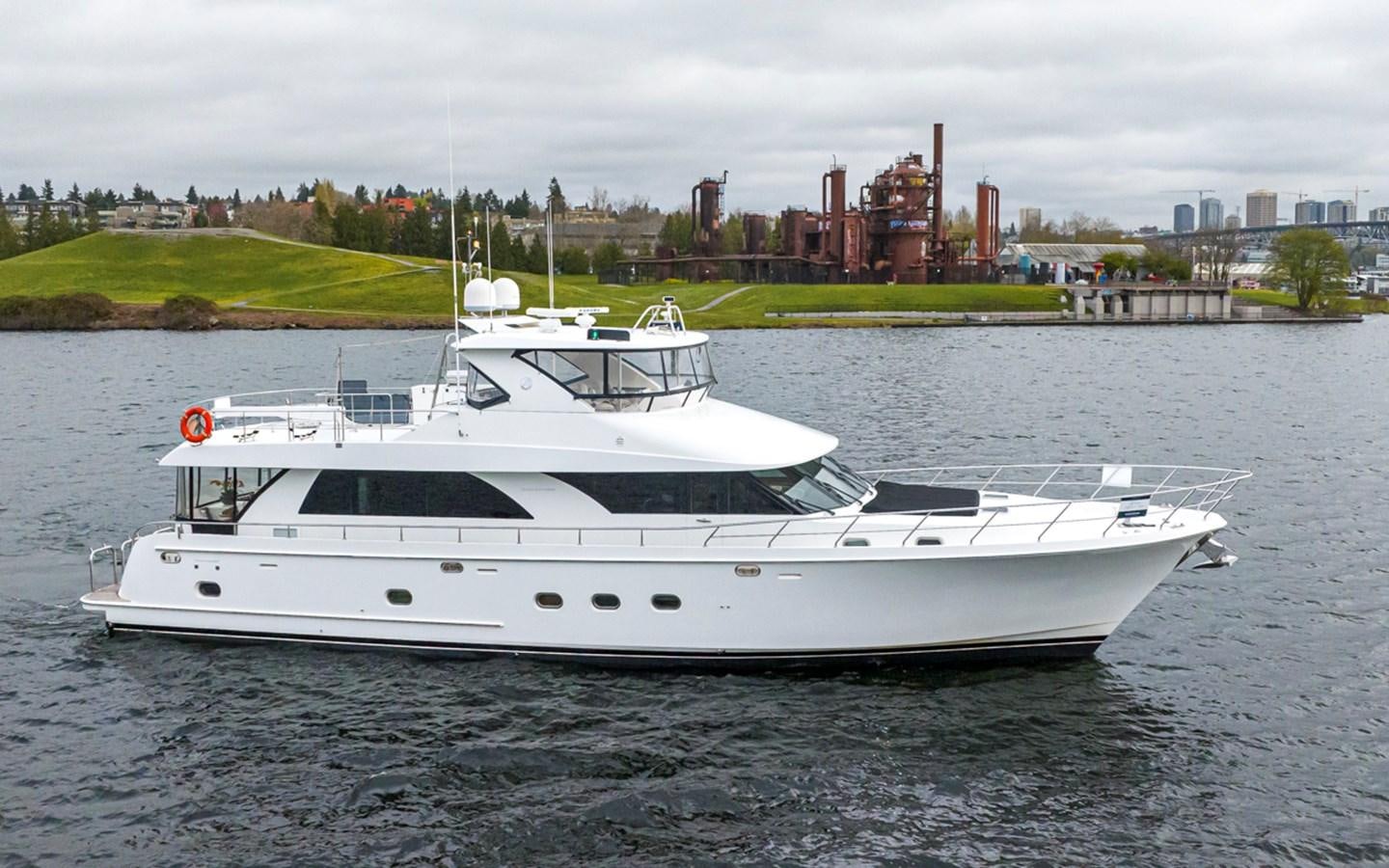 a white yacht on the water aboard COCONUT Yacht for Sale