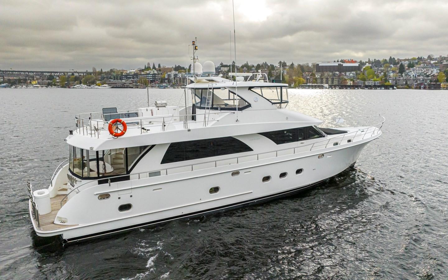 a white yacht on the water aboard COCONUT Yacht for Sale