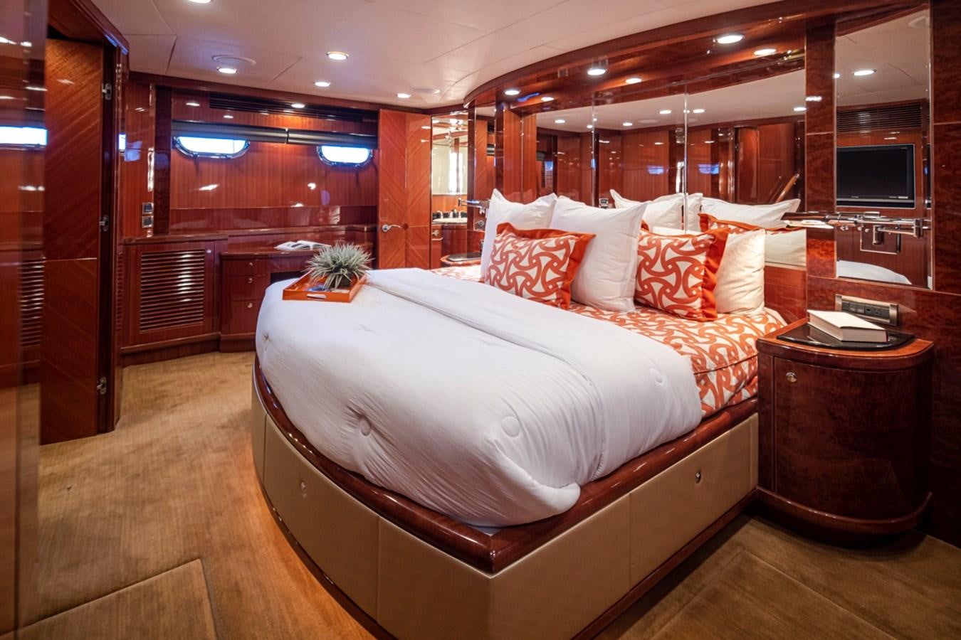 a bed in a room aboard COCONUT Yacht for Sale