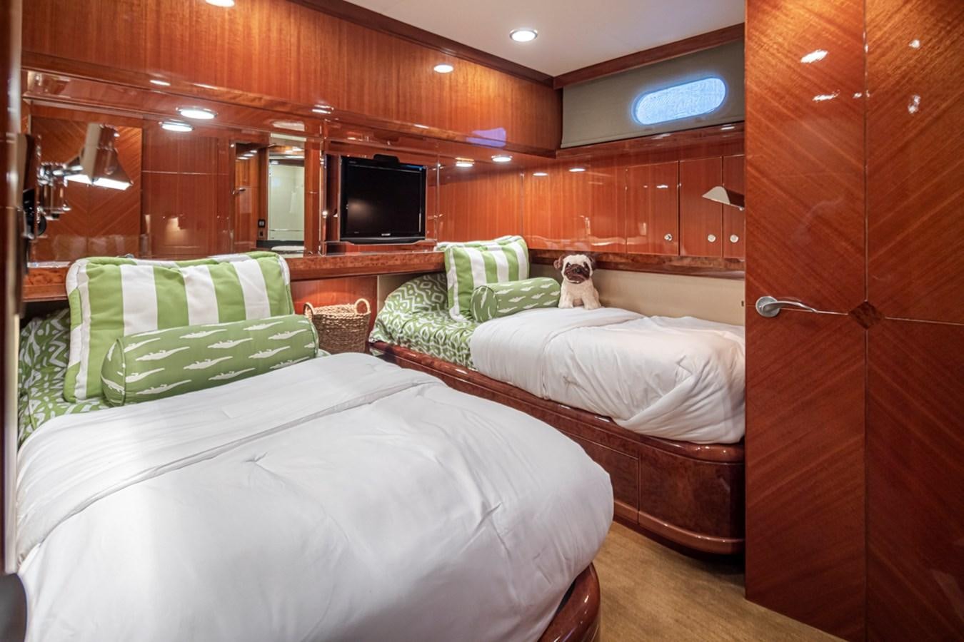 a couple of beds in a cabin aboard COCONUT Yacht for Sale