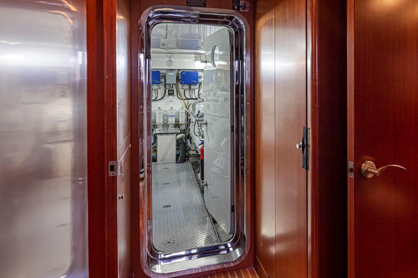 a door with glass doors aboard COCONUT Yacht for Sale