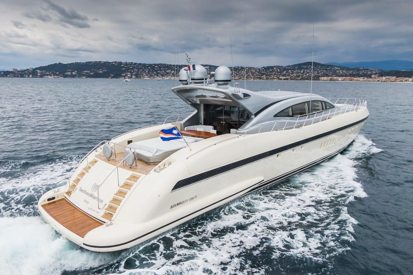 a boat on the water aboard TECHNOMARINE Yacht for Sale