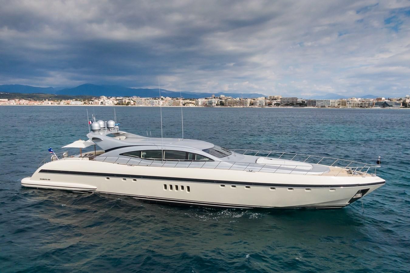a white yacht in the water aboard TECHNOMARINE Yacht for Sale