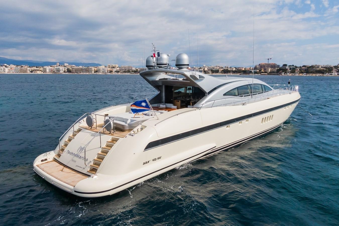 a white yacht in the water aboard TECHNOMARINE Yacht for Sale