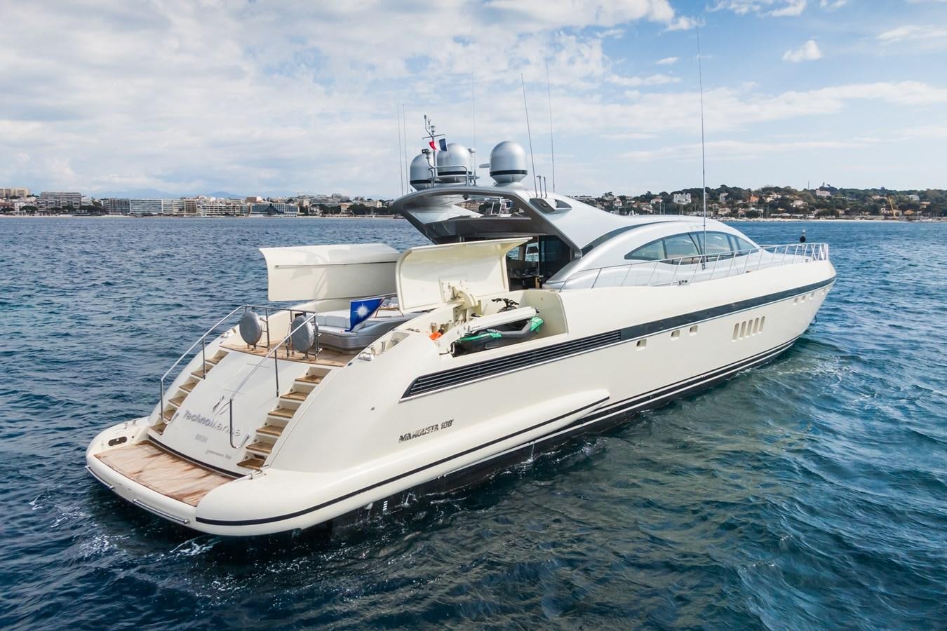 a white boat in the water aboard TECHNOMARINE Yacht for Sale