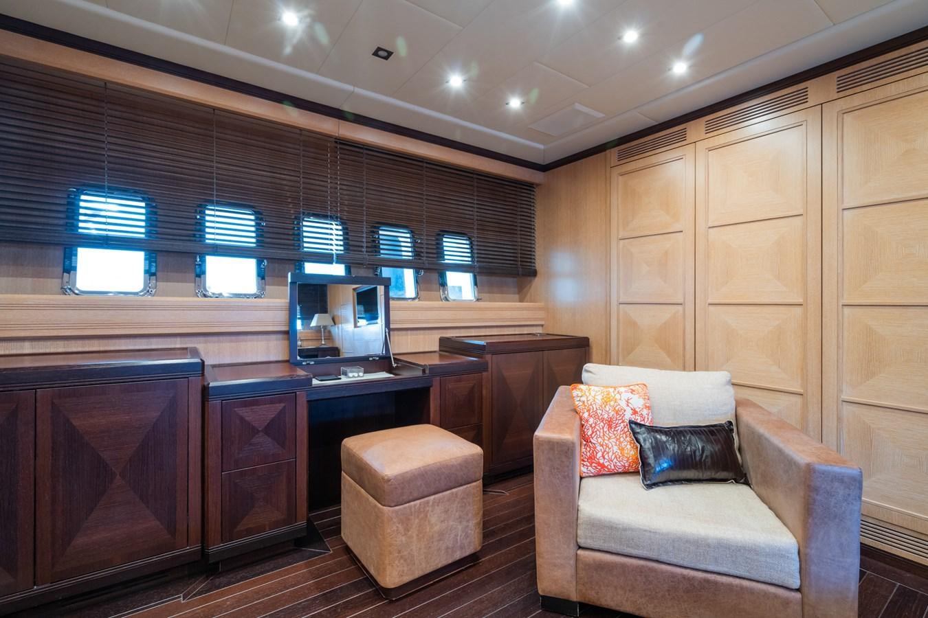 a living room with a couch and a tv aboard TECHNOMARINE Yacht for Sale