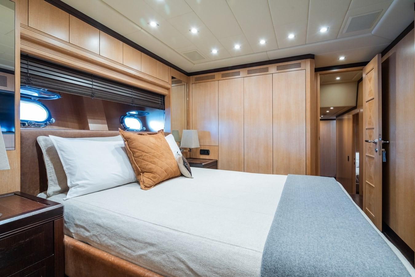 a bed in a room aboard TECHNOMARINE Yacht for Sale