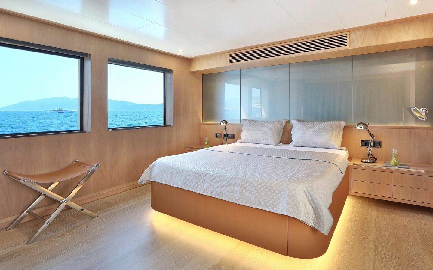 a bedroom with a large bed aboard AEGEAN EXPLORER 26M/02 Yacht for Sale