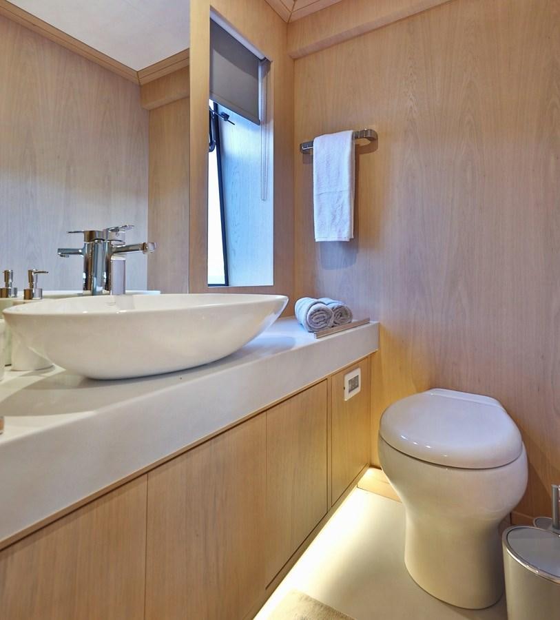 a bathroom with a sink and toilet aboard AEGEAN EXPLORER 26M/02 Yacht for Sale