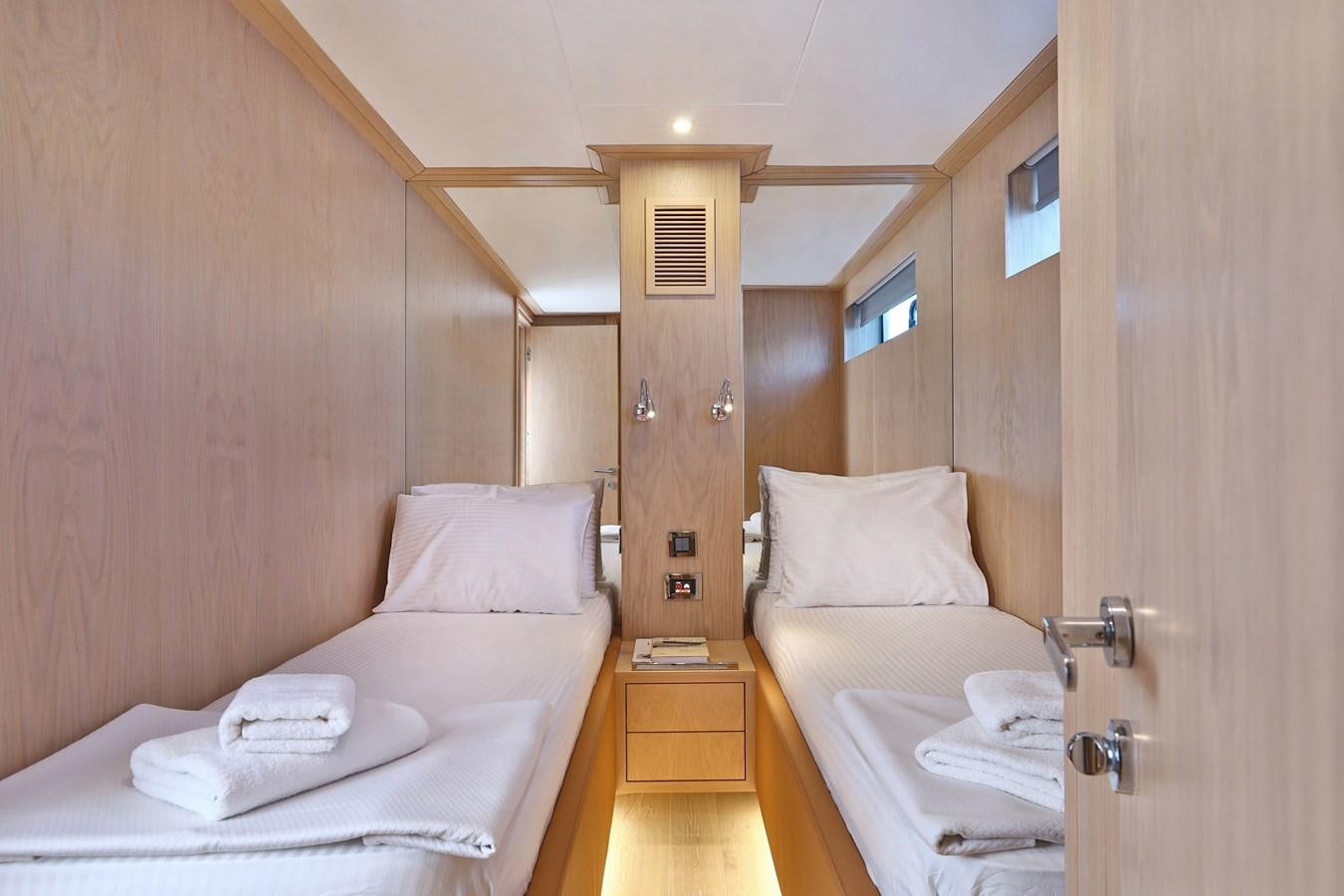 a room with two beds aboard AEGEAN EXPLORER 26M/02 Yacht for Sale