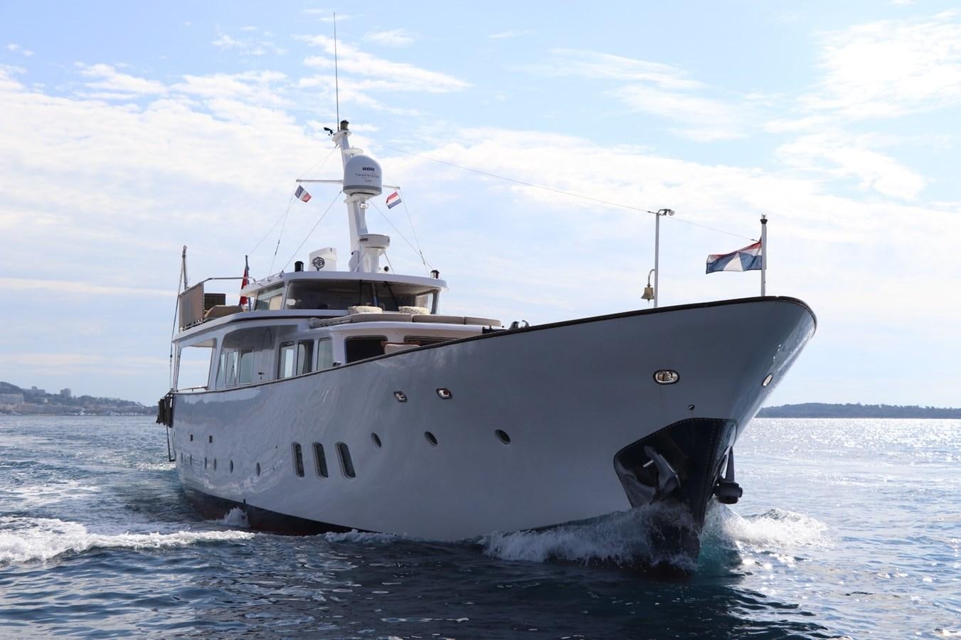 a large white boat in the water aboard SEALORD Yacht for Sale