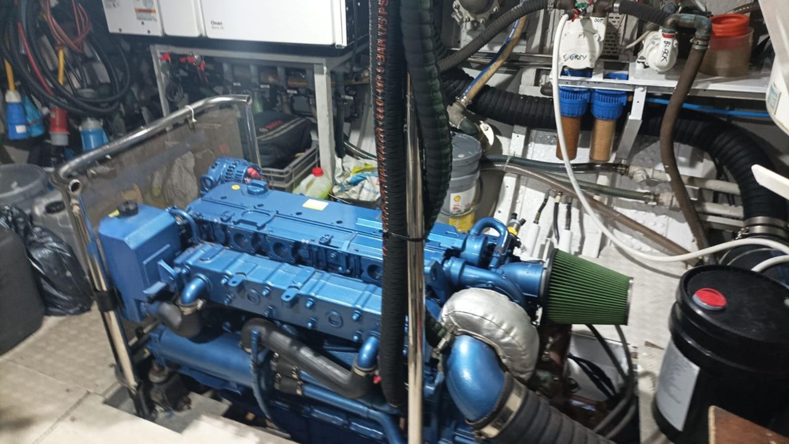 a blue car with a large engine aboard SEALORD Yacht for Sale