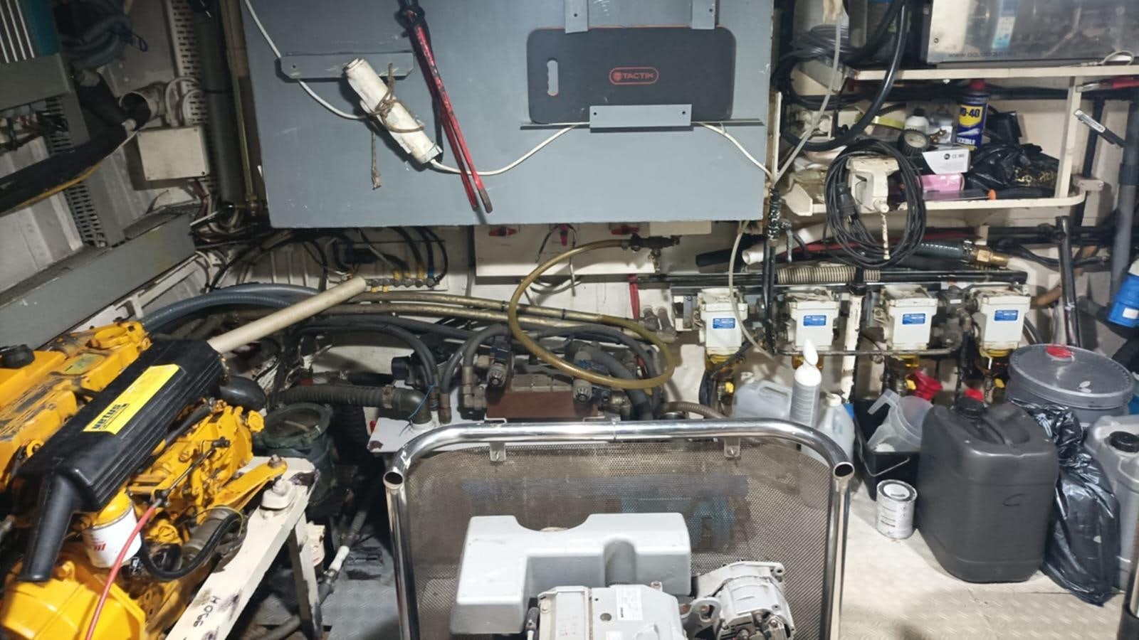 a car with a large engine aboard SEALORD Yacht for Sale