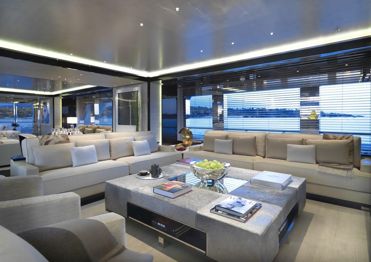 a living room with a large window aboard KAHALANI Yacht for Sale
