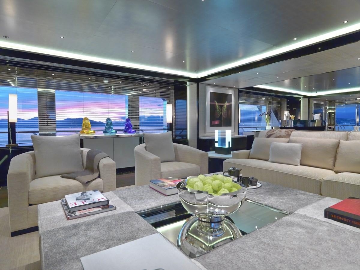 a living room with a large window aboard KAHALANI Yacht for Sale