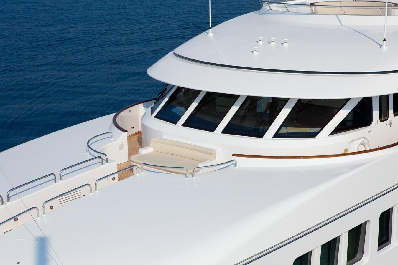 a white yacht on the water aboard KAHALANI Yacht for Sale