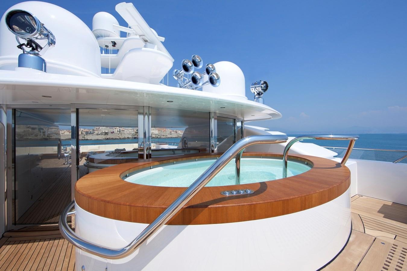 a boat with a satellite dish on the deck aboard KAHALANI Yacht for Sale