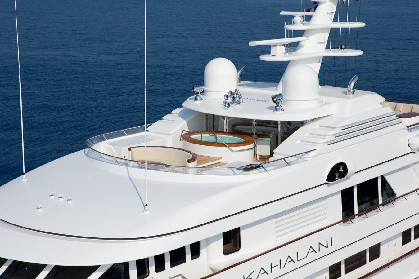 a white yacht on the water aboard KAHALANI Yacht for Sale