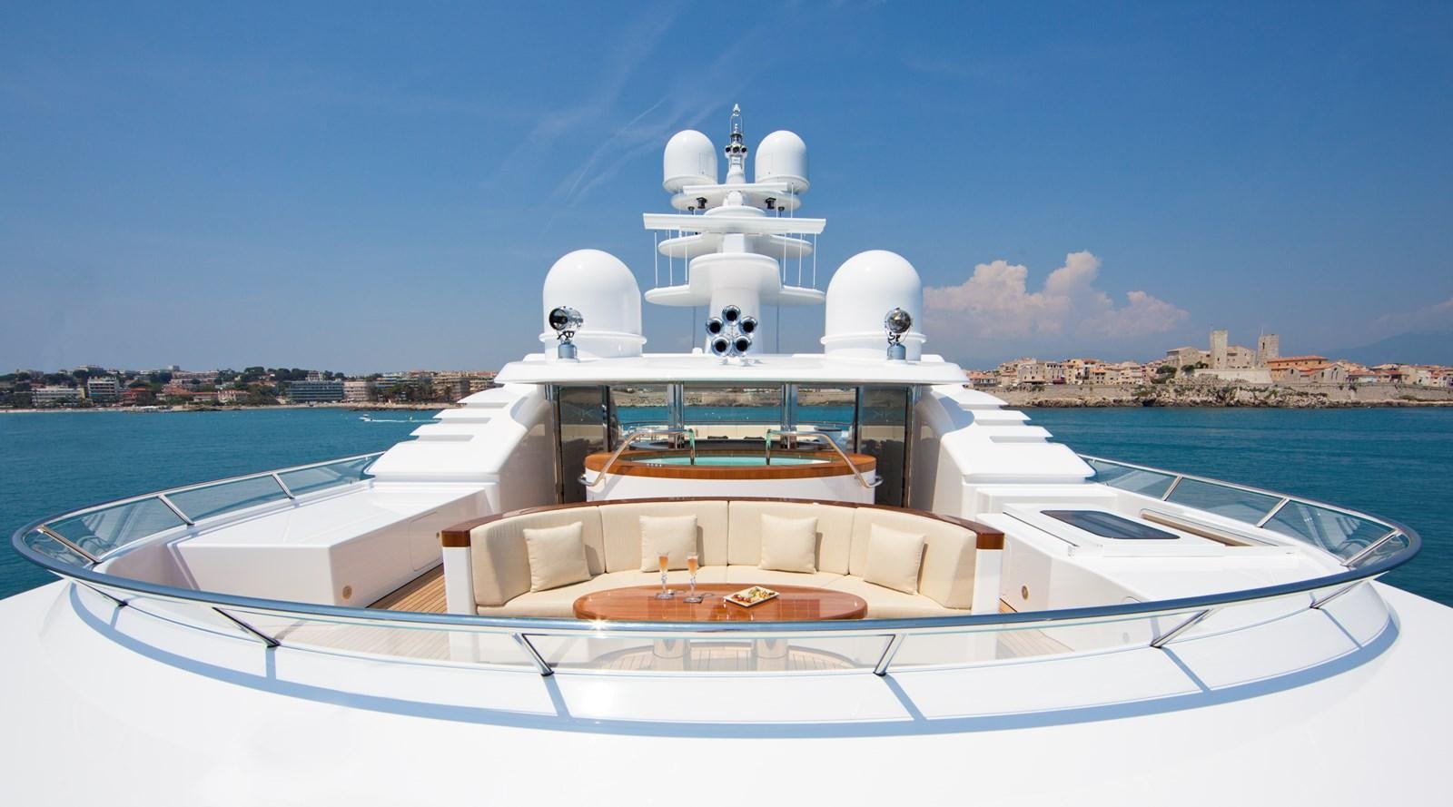 a white yacht on the water aboard KAHALANI Yacht for Sale