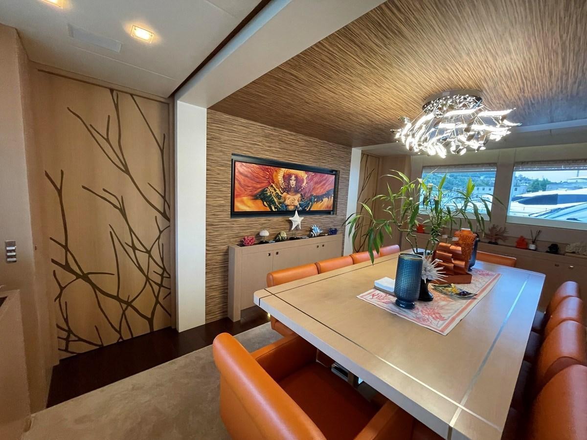 a room with a table and chairs aboard ESPRESSO Yacht for Sale