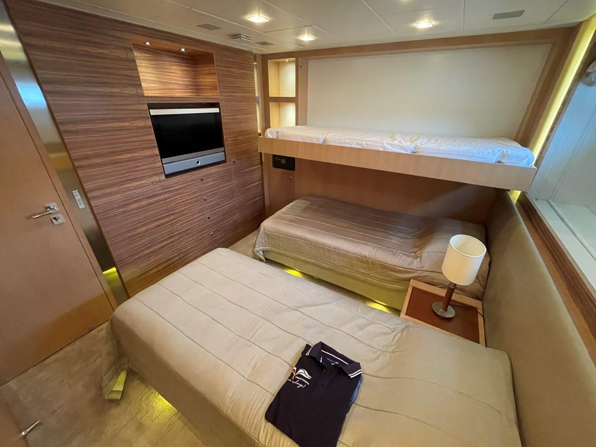 a room with a bed and a tv aboard ESPRESSO Yacht for Sale