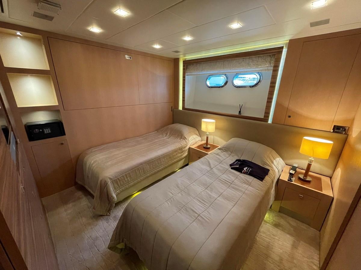 a room with two beds aboard ESPRESSO Yacht for Sale