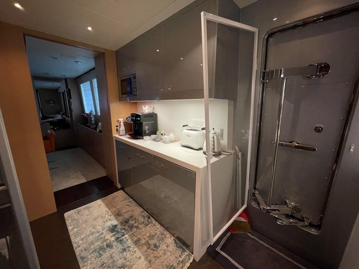 a kitchen with a sink and a refrigerator aboard ESPRESSO Yacht for Sale