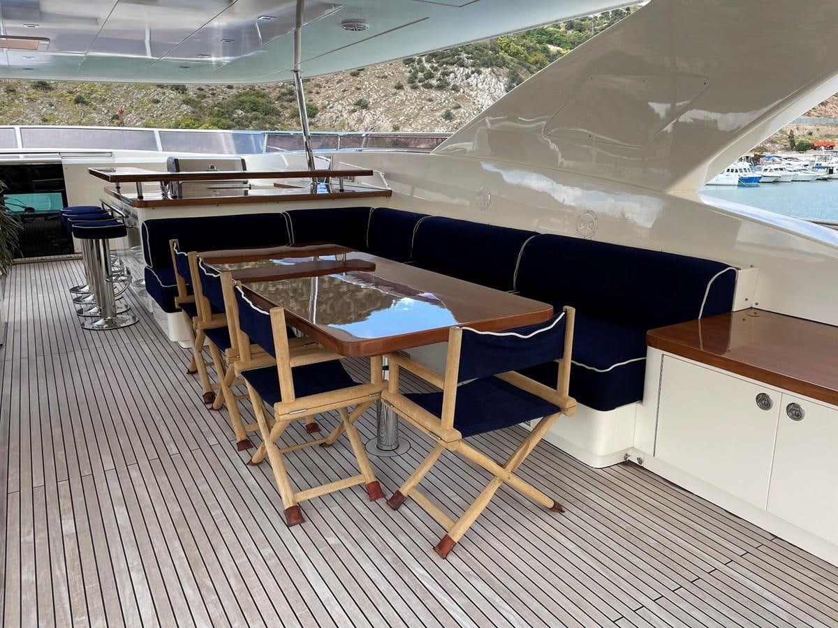 a room with a table and chairs aboard ESPRESSO Yacht for Sale
