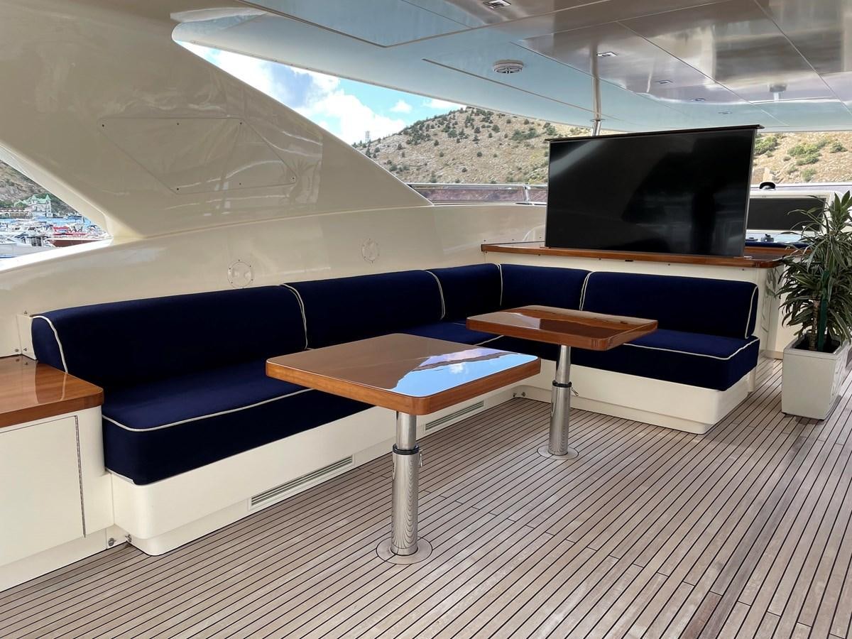 a room with a couch and a tv aboard ESPRESSO Yacht for Sale