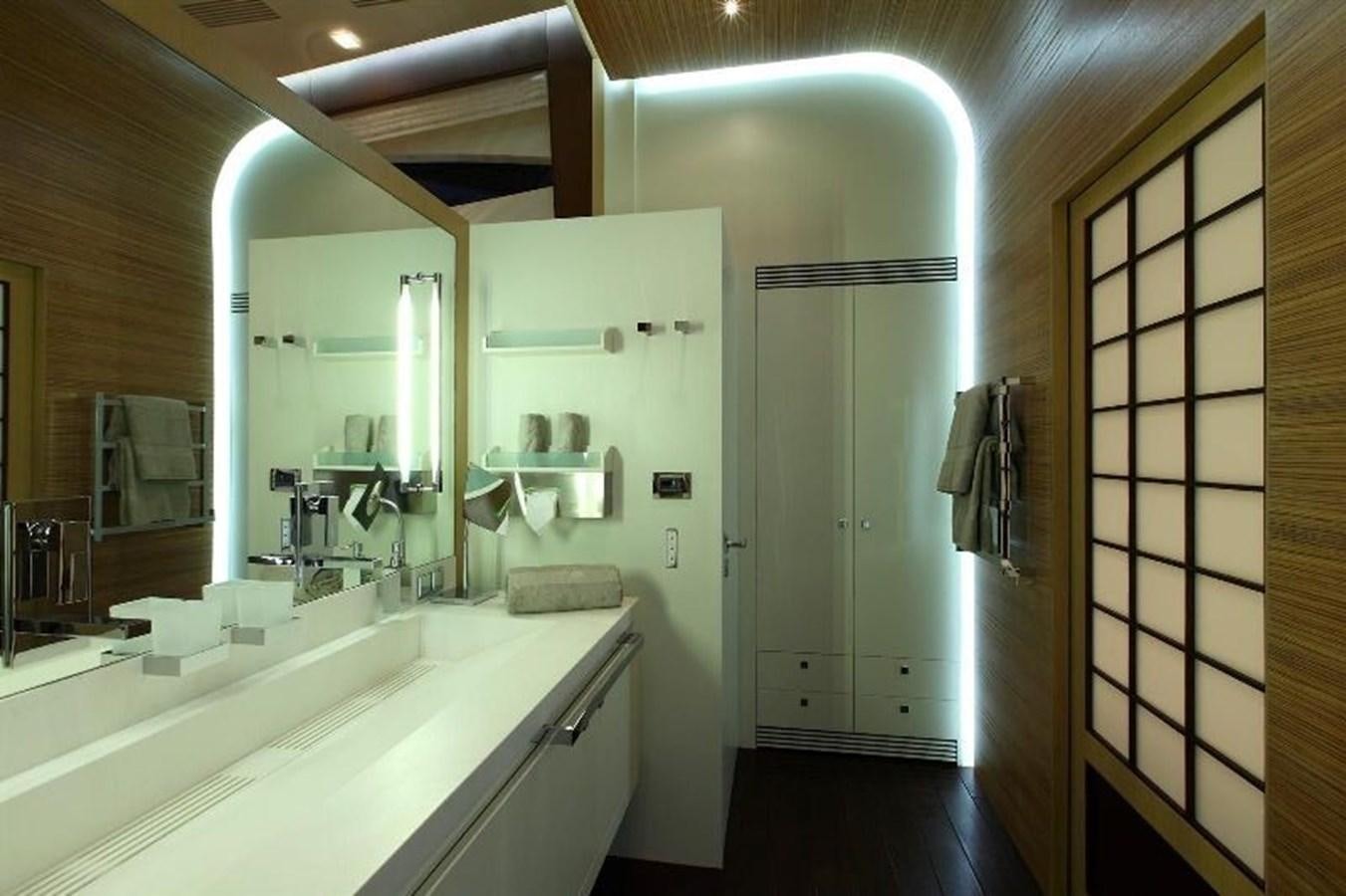 a bathroom with a sink and a mirror aboard ESPRESSO Yacht for Sale