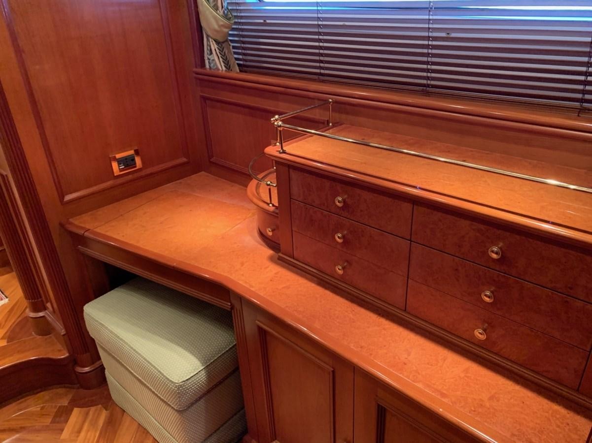 a dresser with a bucket on top aboard DREAM ON II Yacht for Sale