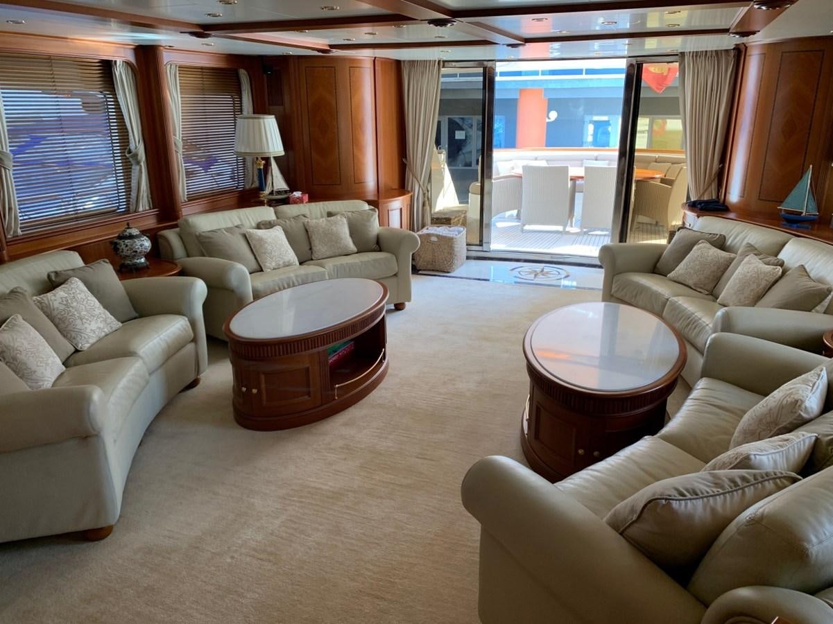 a living room with a large window aboard DREAM ON II Yacht for Sale
