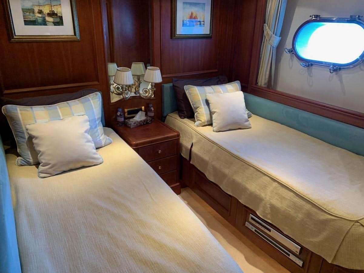 a couple of beds in a hotel room aboard DREAM ON II Yacht for Sale
