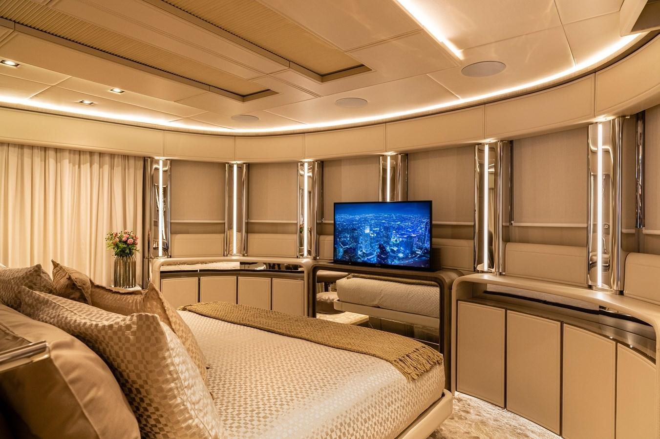 a room with a tv and couch aboard THE PEDDLER Yacht for Sale