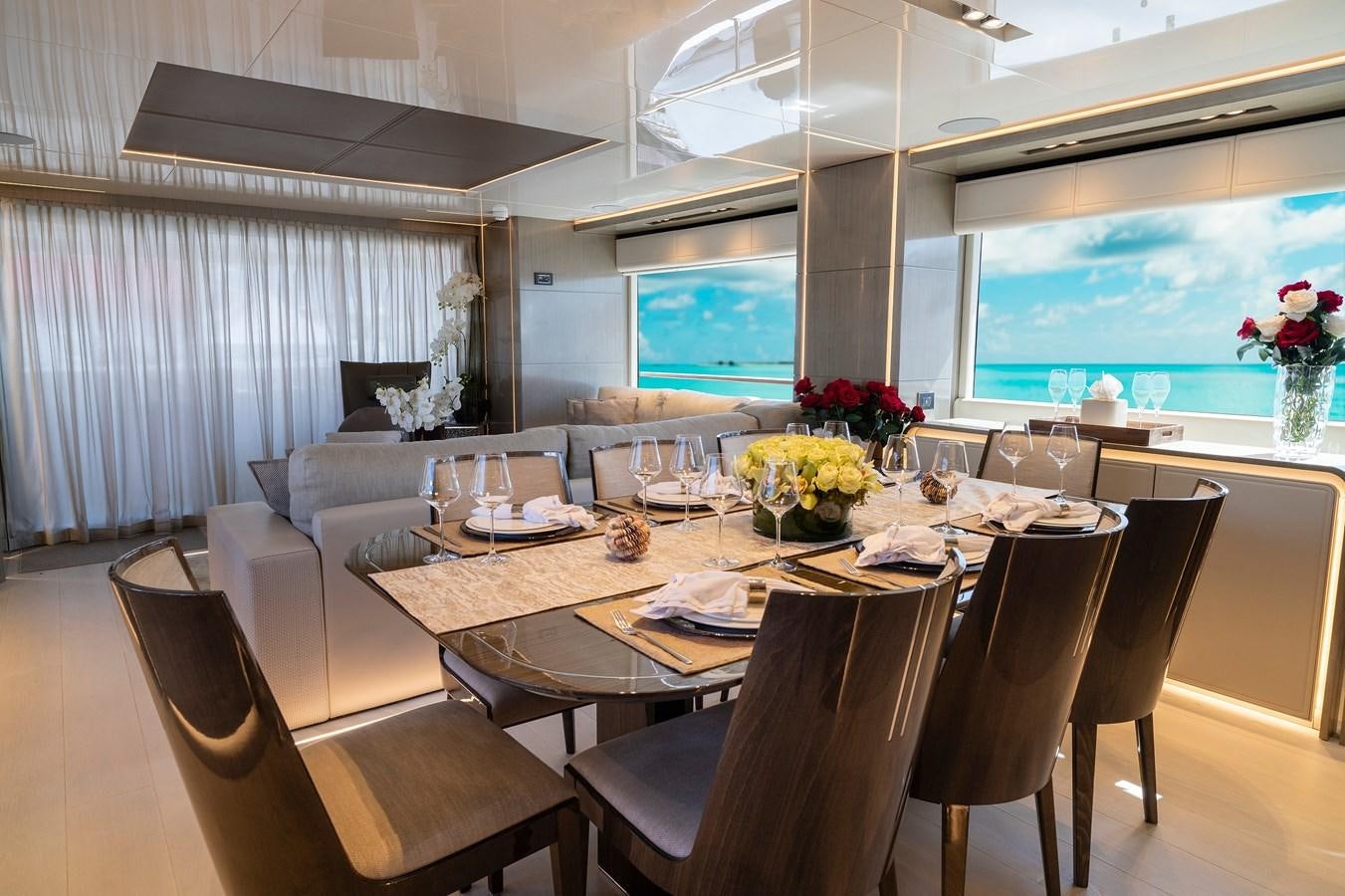 a large dining table with chairs aboard THE PEDDLER Yacht for Sale