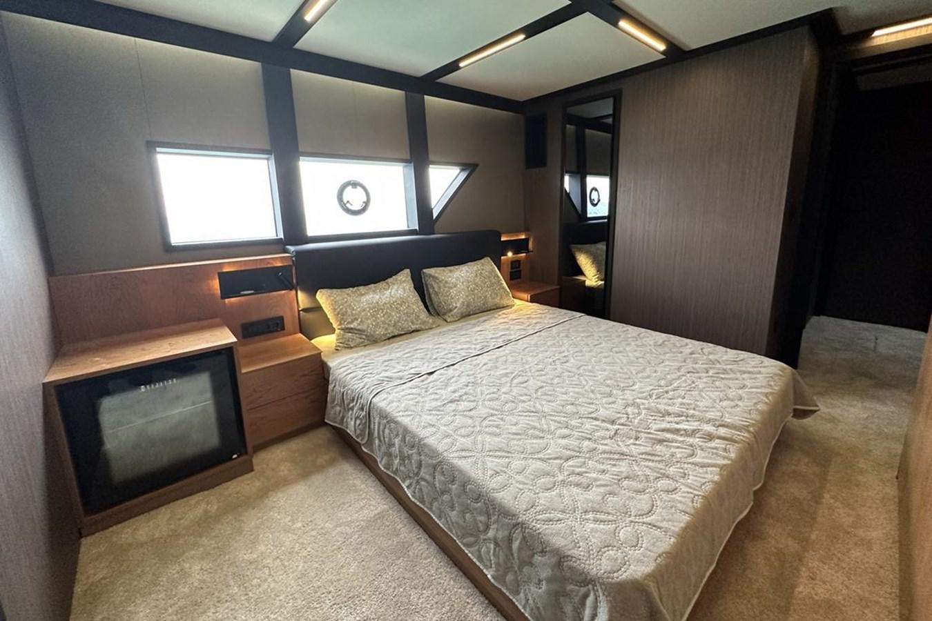 a bed in a room aboard CARBOYACHT 68 Yacht for Sale