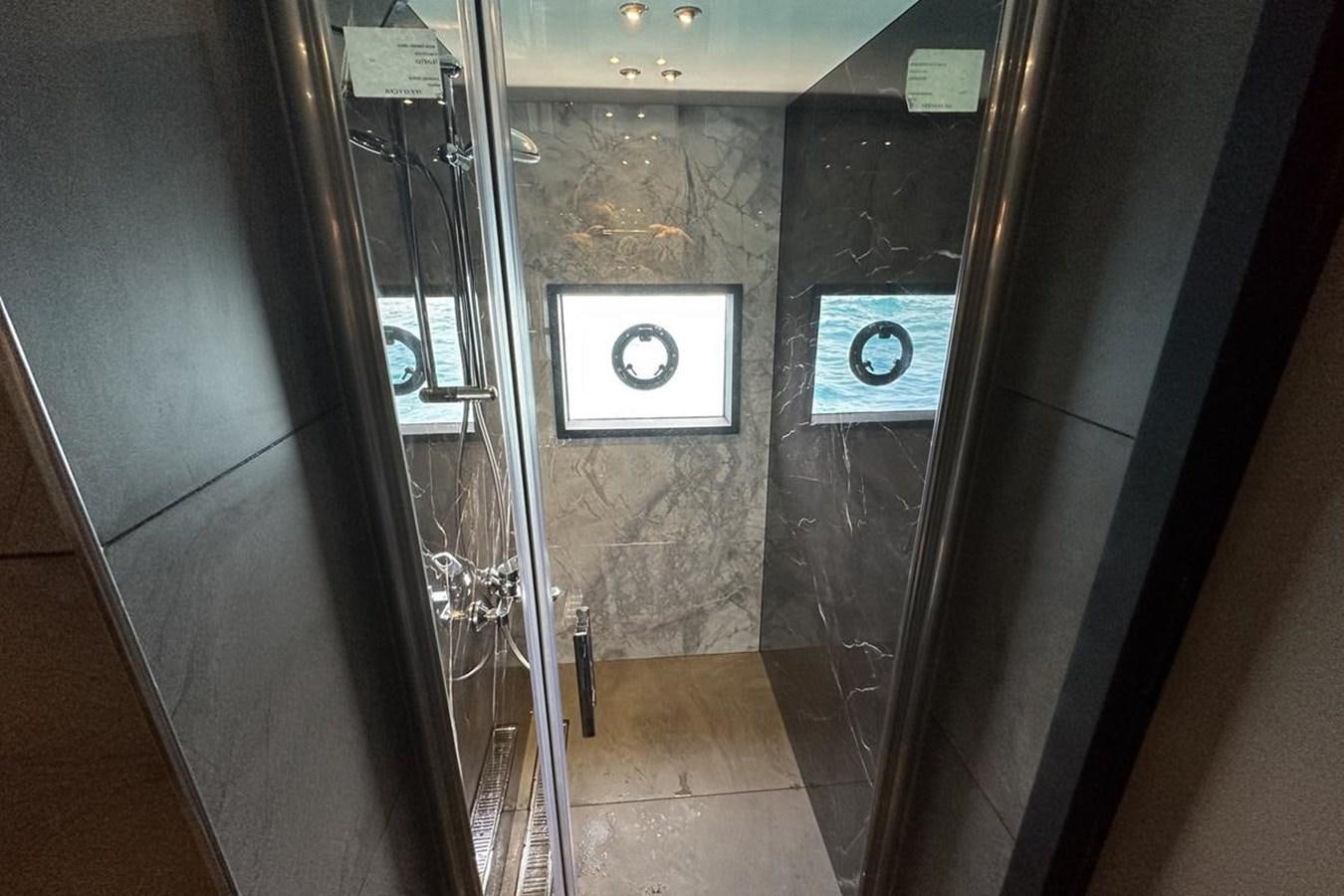 a hallway with a glass door aboard CARBOYACHT 68 Yacht for Sale
