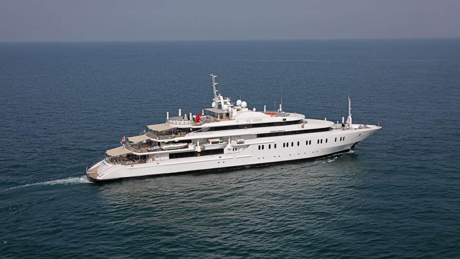 a large ship in the water aboard MOONLIGHT II Yacht for Sale