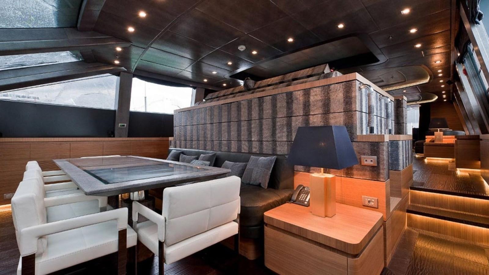 a room with a table and chairs aboard ELIZAVETA Yacht for Sale