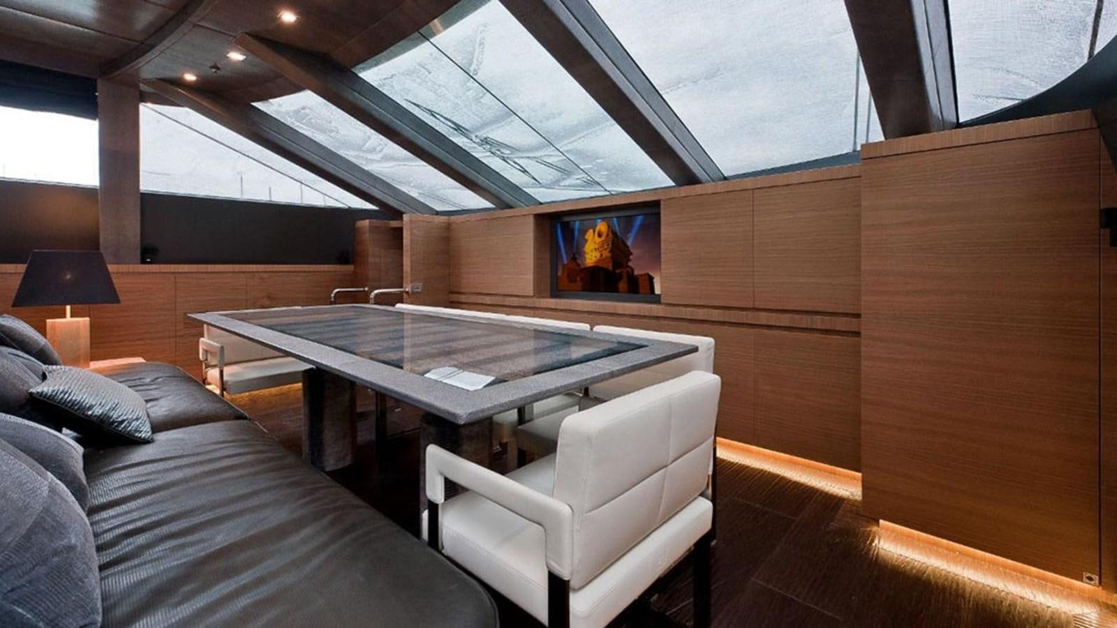 a room with a table and chairs aboard ELIZAVETA Yacht for Sale