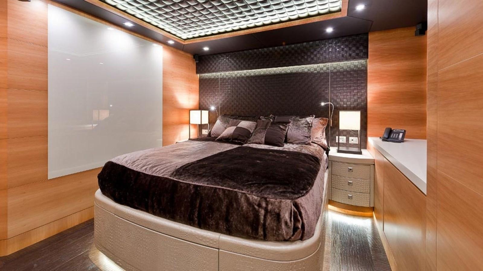 a bed in a room aboard ELIZAVETA Yacht for Sale