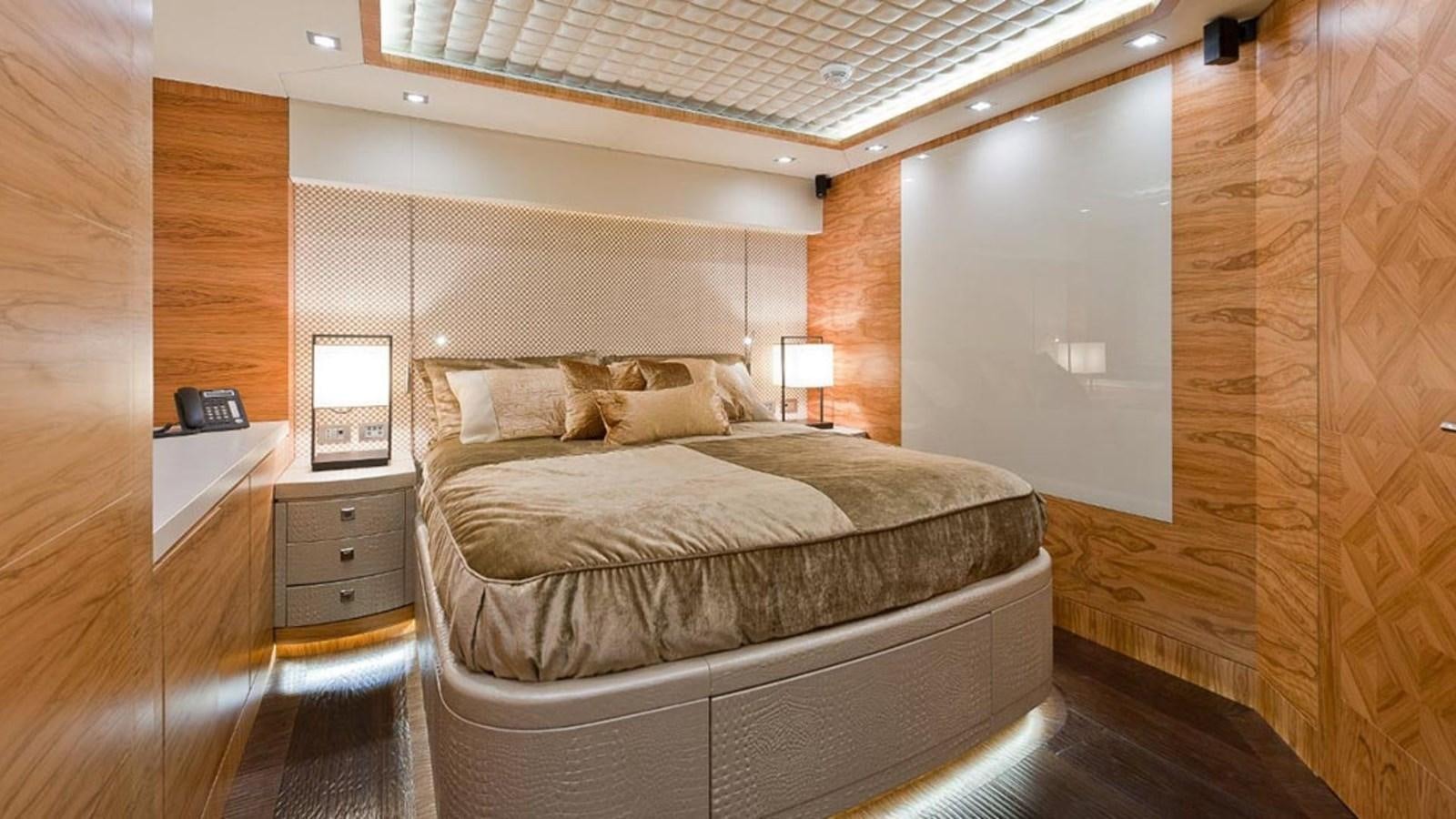 a bed in a room aboard ELIZAVETA Yacht for Sale
