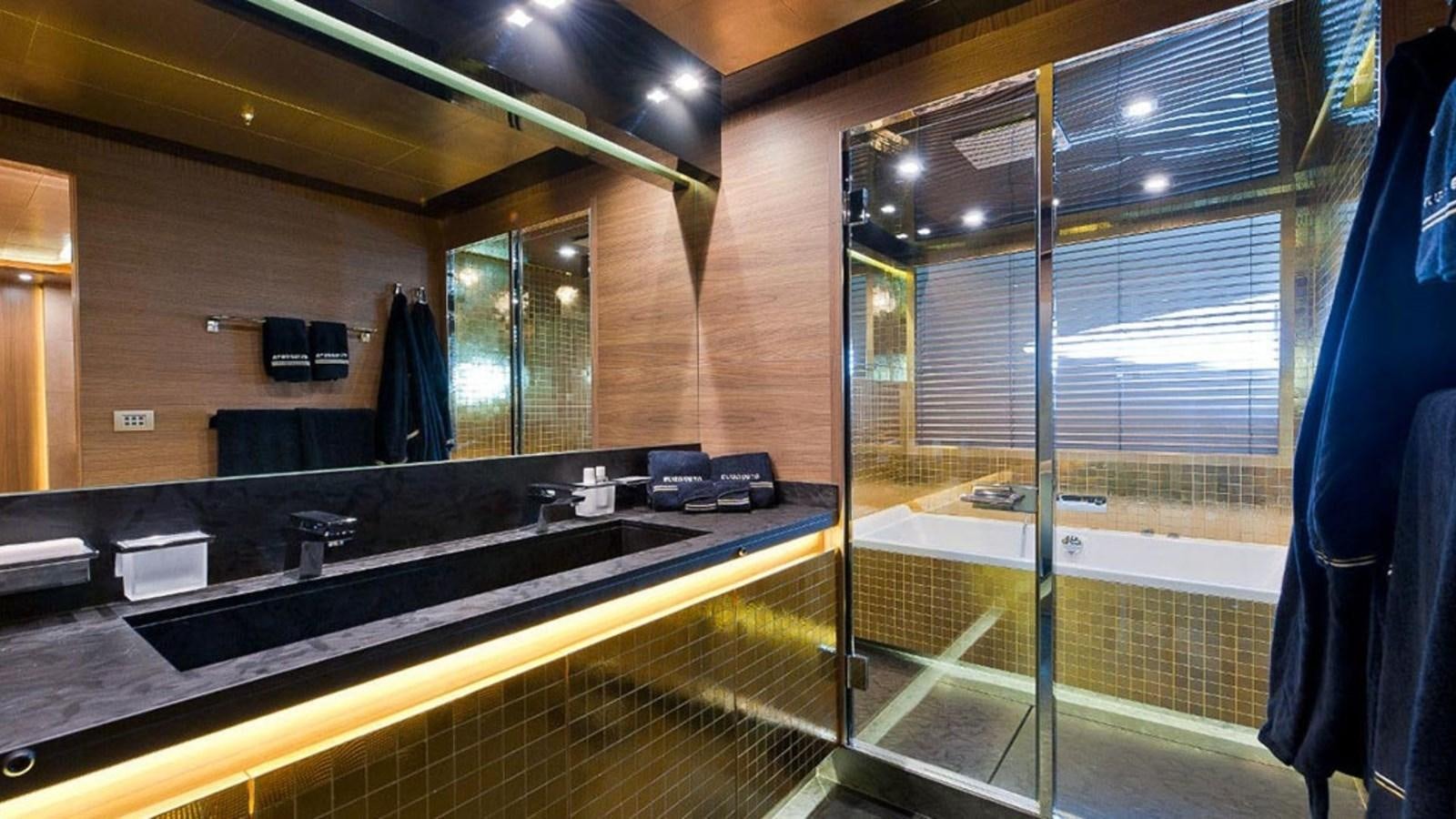 a bathroom with a large glass shower aboard ELIZAVETA Yacht for Sale