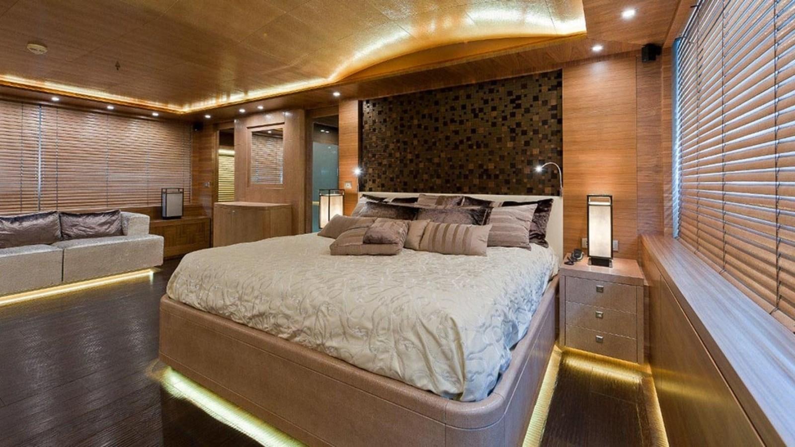 a large bed in a room aboard ELIZAVETA Yacht for Sale