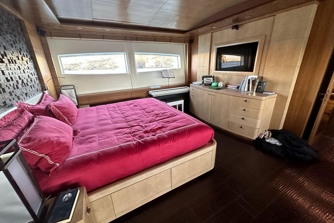 a bedroom with a bed aboard ELIZAVETA Yacht for Sale