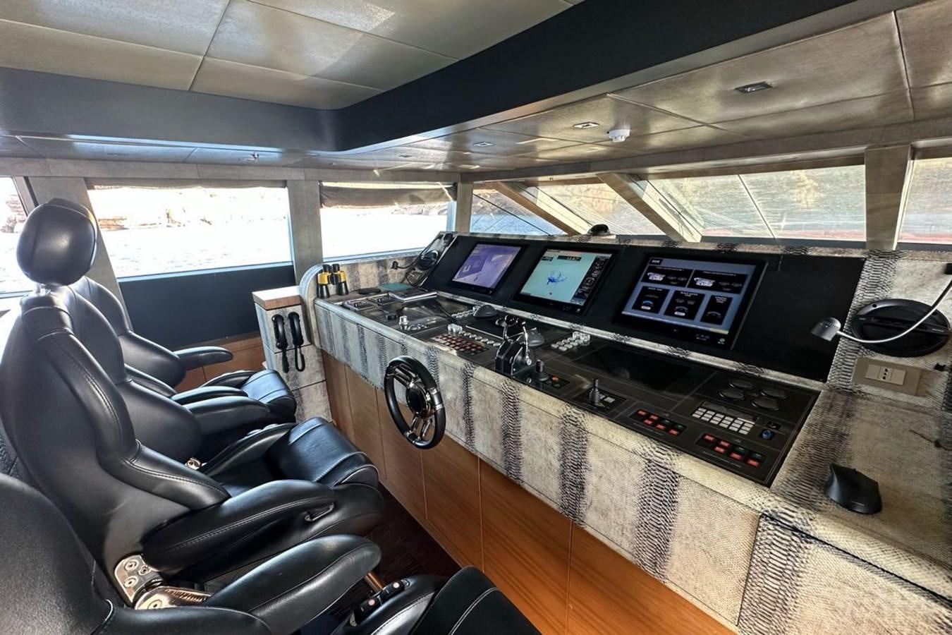 inside of a vehicle with many monitors aboard ELIZAVETA Yacht for Sale