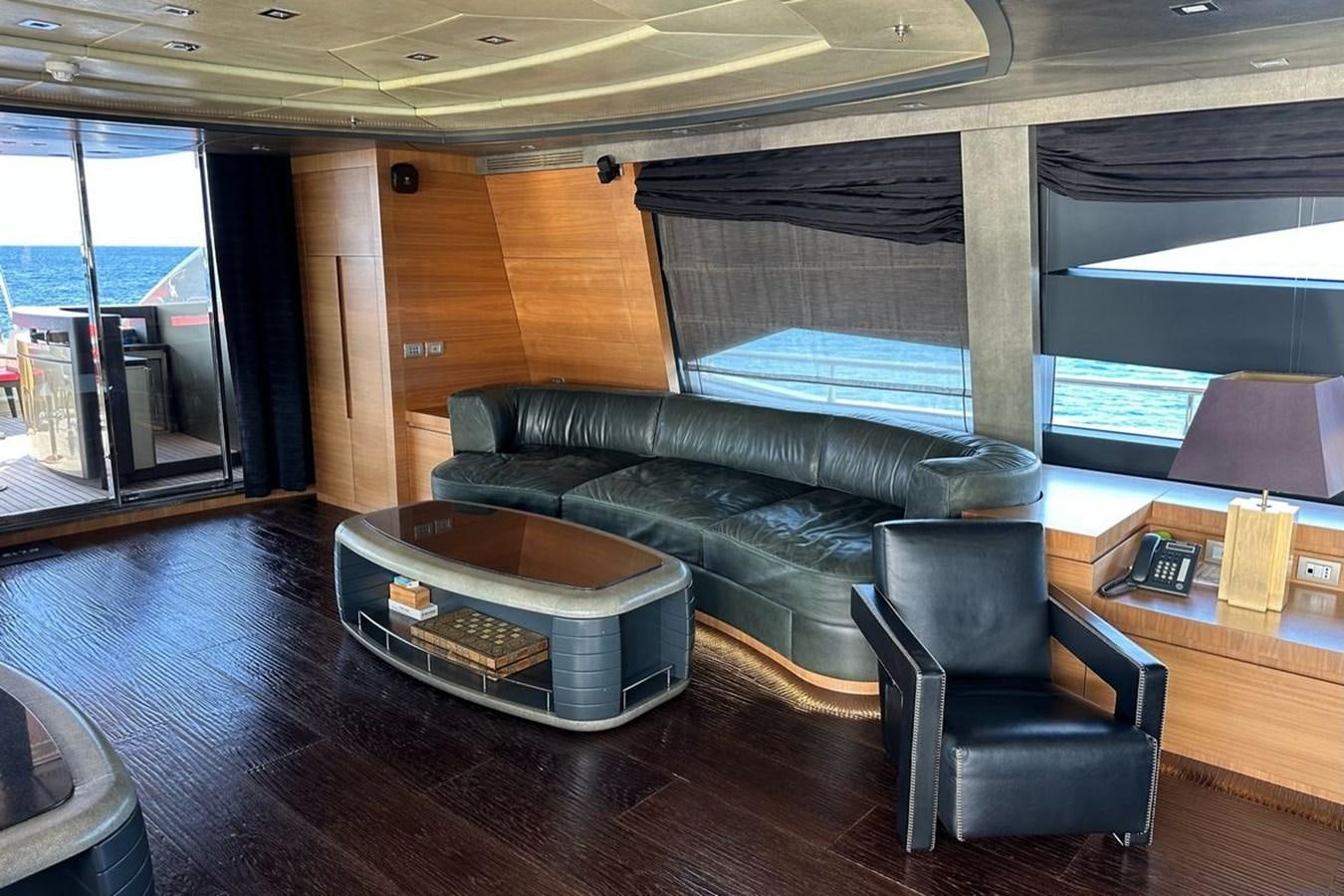 a living room with a couch and a coffee table aboard ELIZAVETA Yacht for Sale