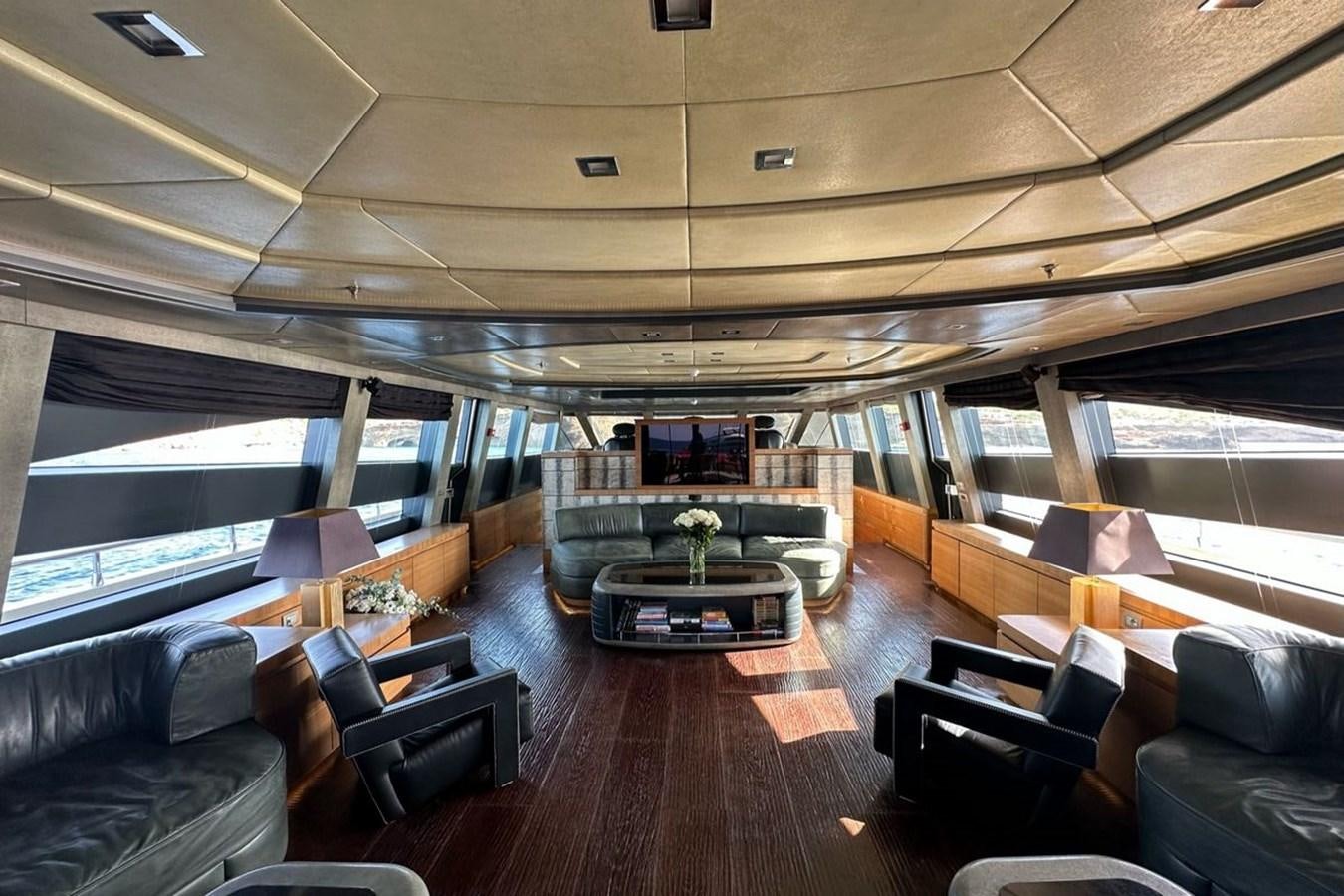 a room with a table and chairs aboard ELIZAVETA Yacht for Sale