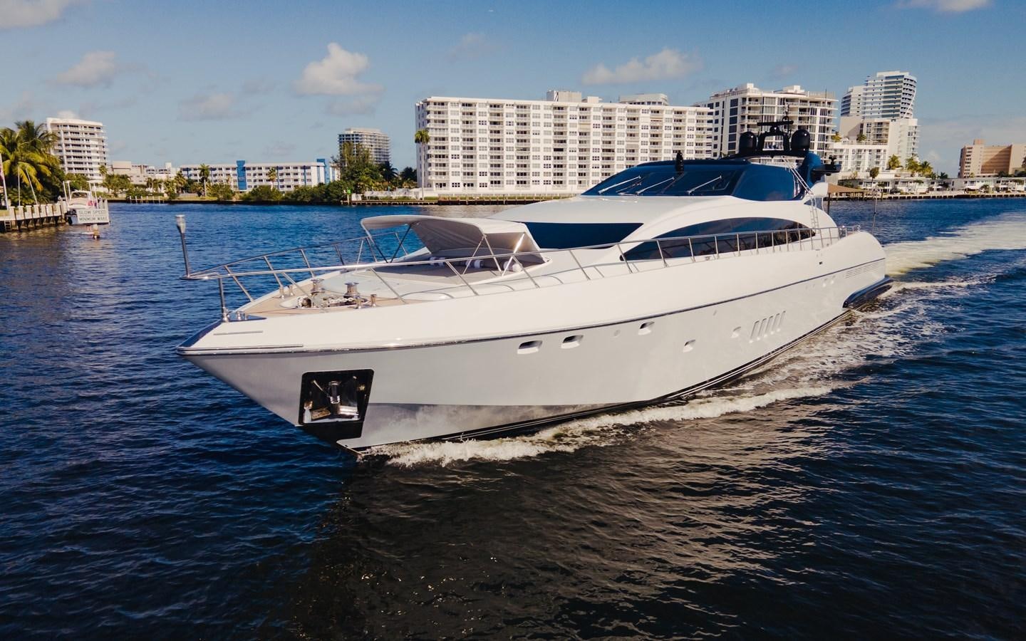 a white boat on the water aboard 7 KNOTS Yacht for Sale